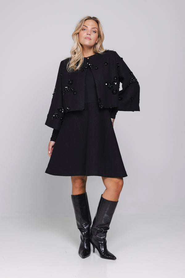  detail: Detail Ylva Dress met lange aangesloten mouw